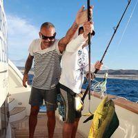Christian Audigier catches a huge fish with his girlfriend Nathalie Sorensen | Picture 124258